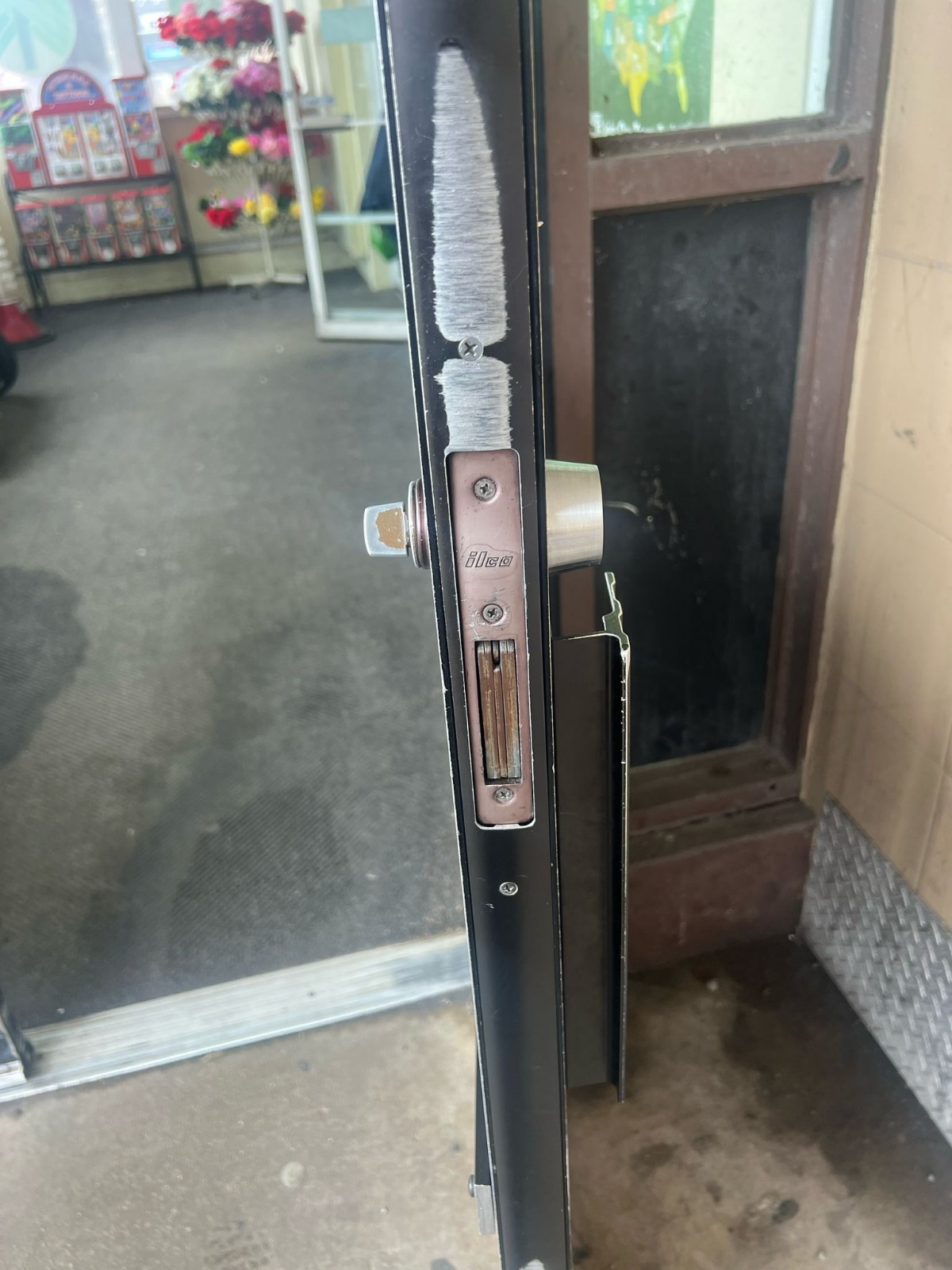 Before: Standard mechanical brass door lock